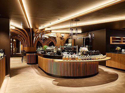 Elegant restaurant buffet with wooden decor and ambient lighting